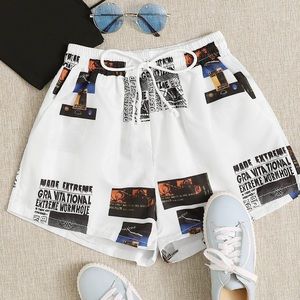 Newspaper print drawstring shorts